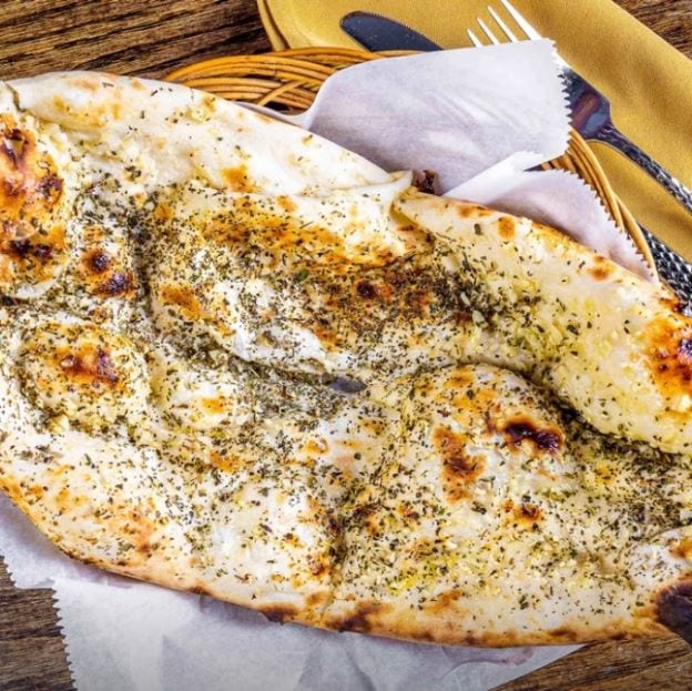 Basil Garlic Naan Signature.